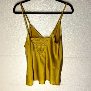 NWT. Woman’s Etam lace lingerie tank top in gold. Size M.